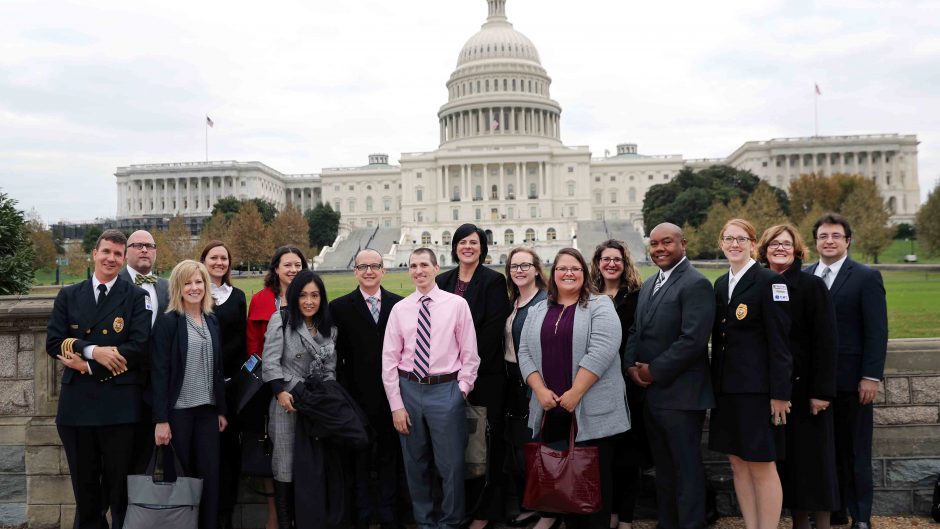 A photo of a class in front of the capitol building in DC